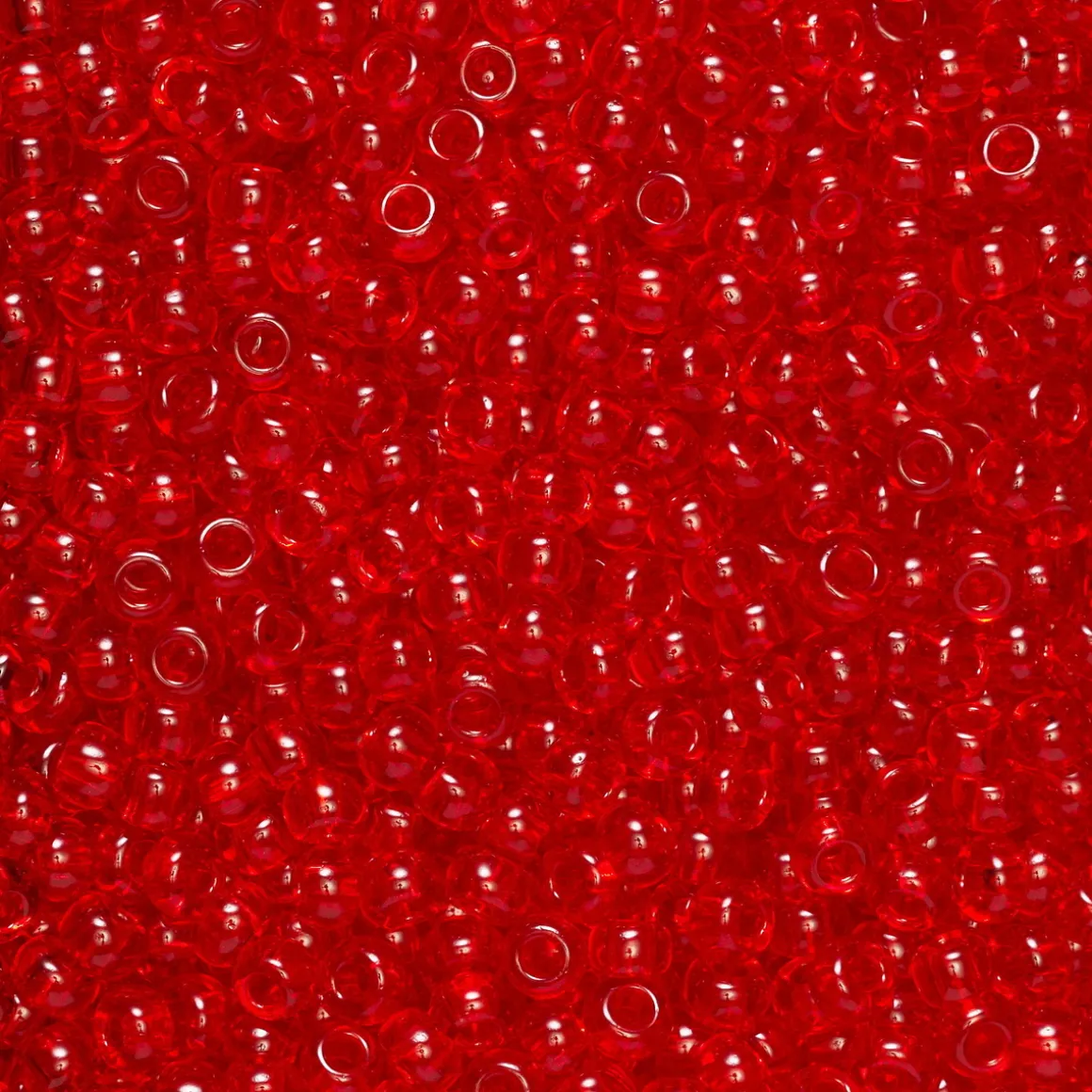 Rocaillesperle 9/0 transp rød