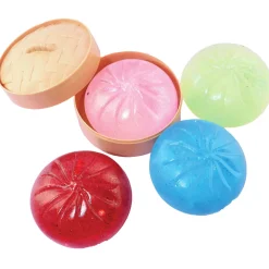 Squeezy Dumpling Glitter, glitrende squeezys med diameter 10 cm, pris per stykk, esker med vilkårlig farge på squeezyen