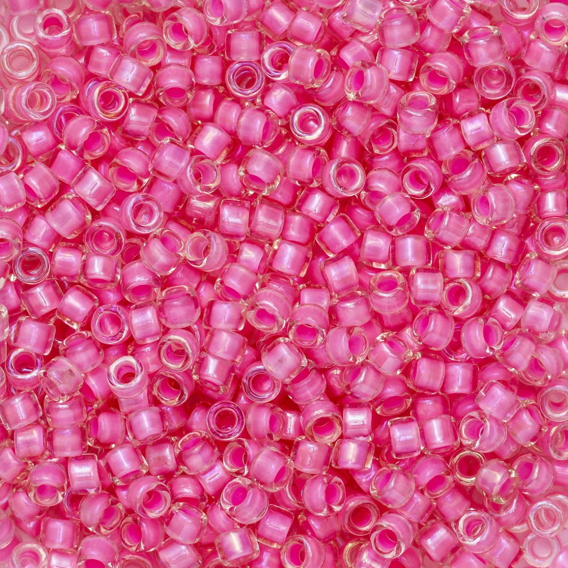 TOHO-perler 11/0 – 191C Hot pink inside lined
