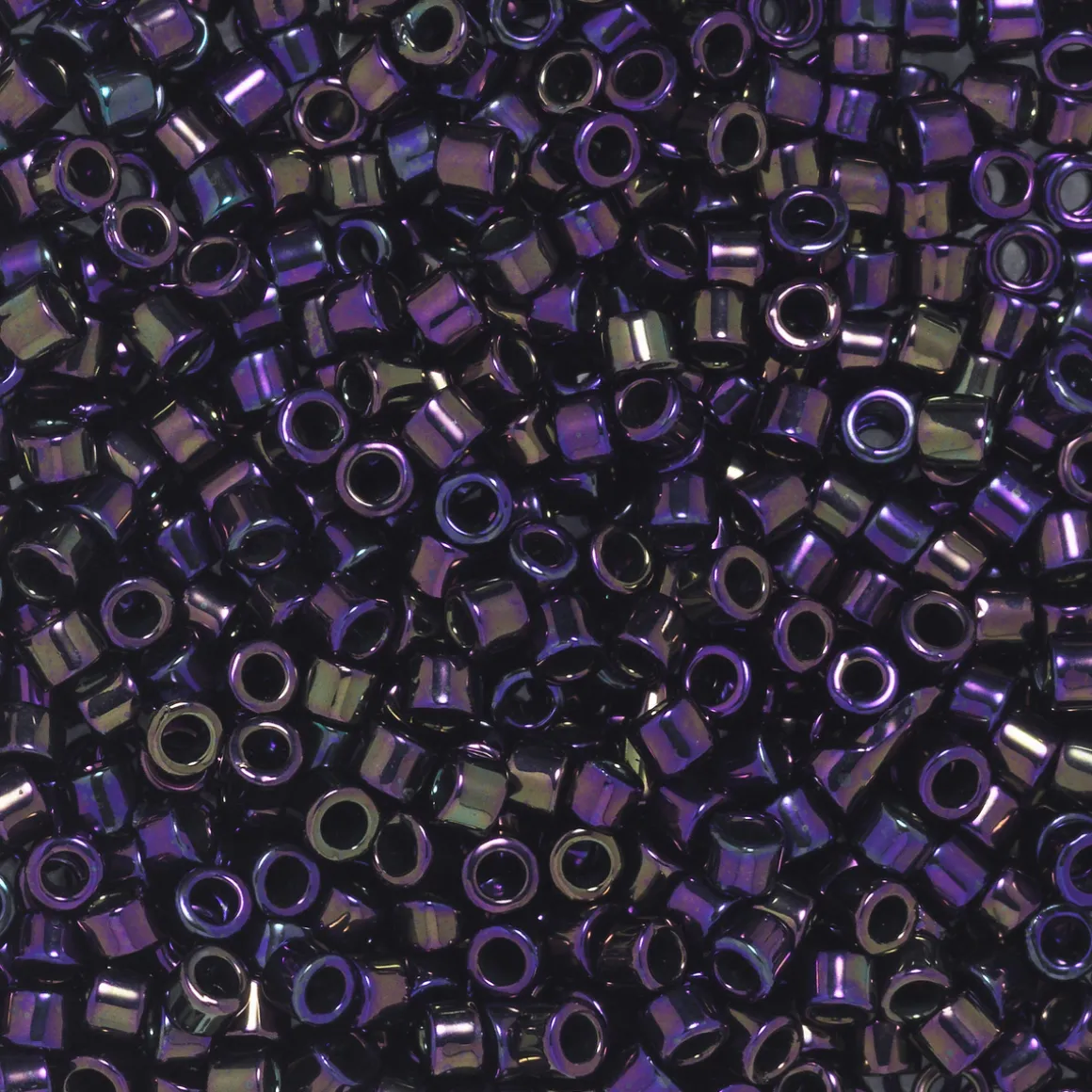 TOHO-perler 11/0 – lilla metallic, 85 Metallic iris purple