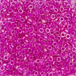 TOHO-perler 11/0 – neonlilla 790 IC crystal/opaque fuchsia-lined