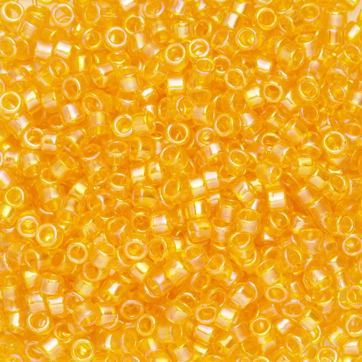 TOHO-perler 11/0 – oransje skimmer, 174 Transparent light hyacinth rainbow