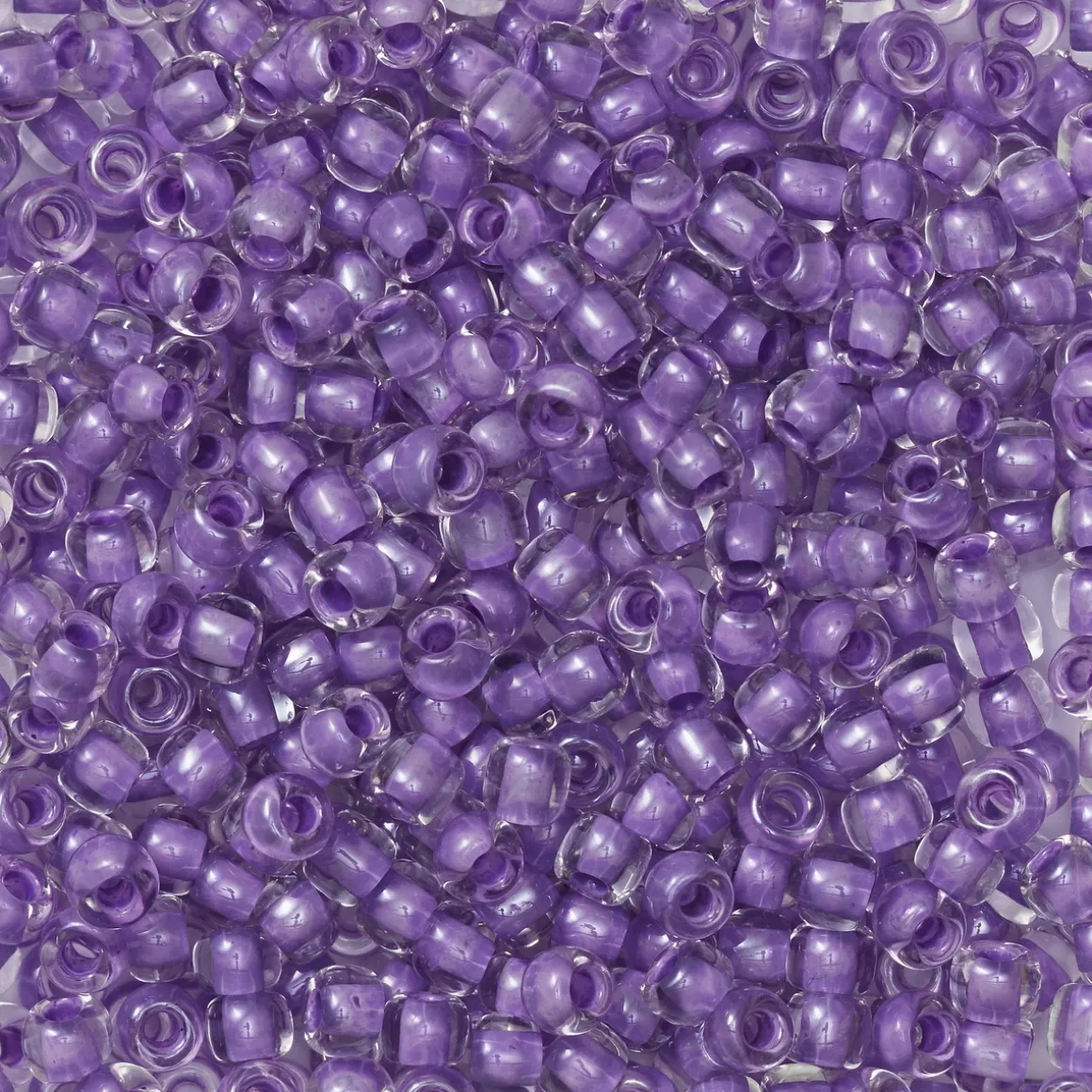 TOHO-perler runde 11/0 – klarlilla, 943 Lilac lined Crystal