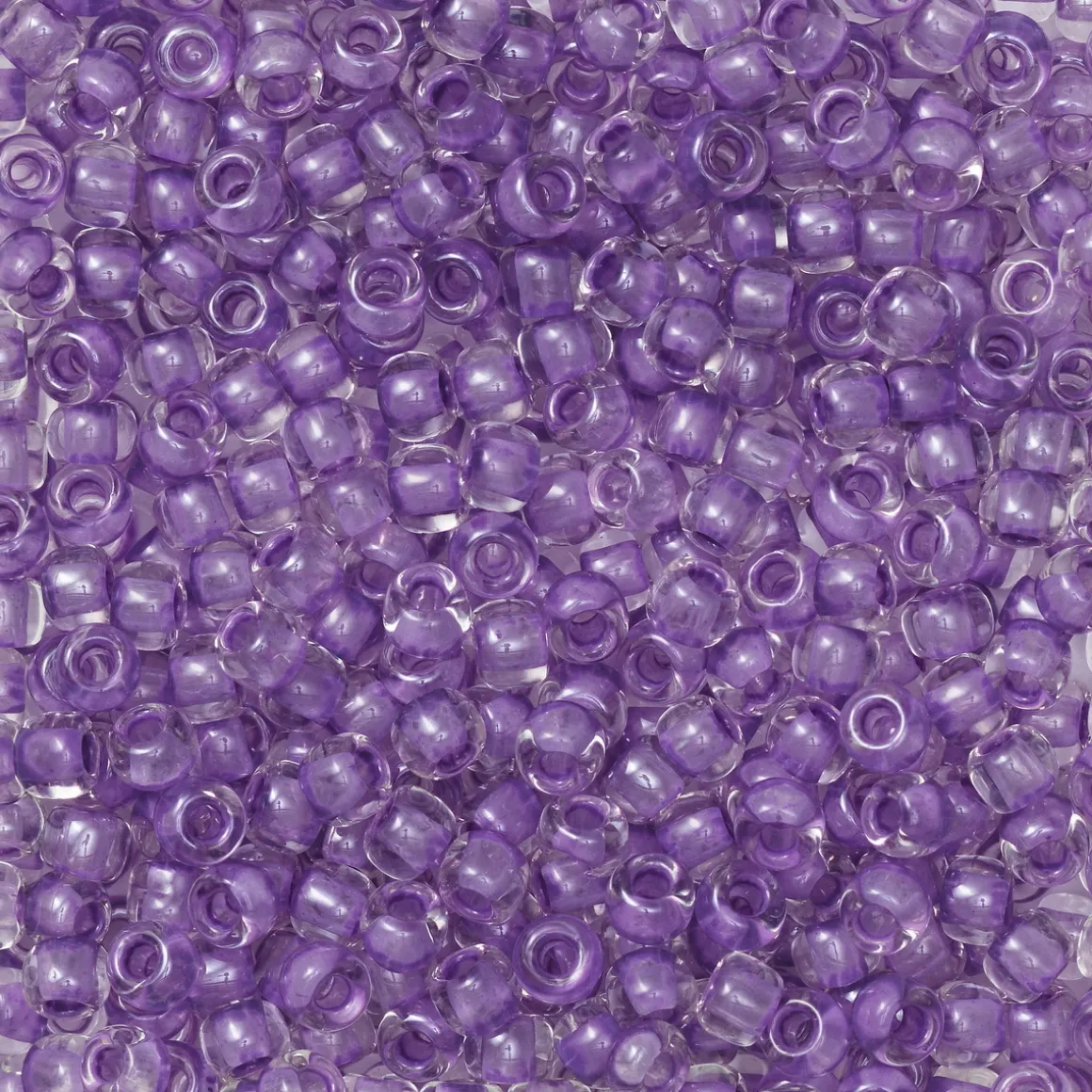 TOHO-perler runde 11/0 – lyselilla, 935 Purple lined crystal