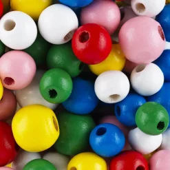 Treperler i en fargerik blanding, Ø10–14 mm. 80 gram, cirka 120–140 perler